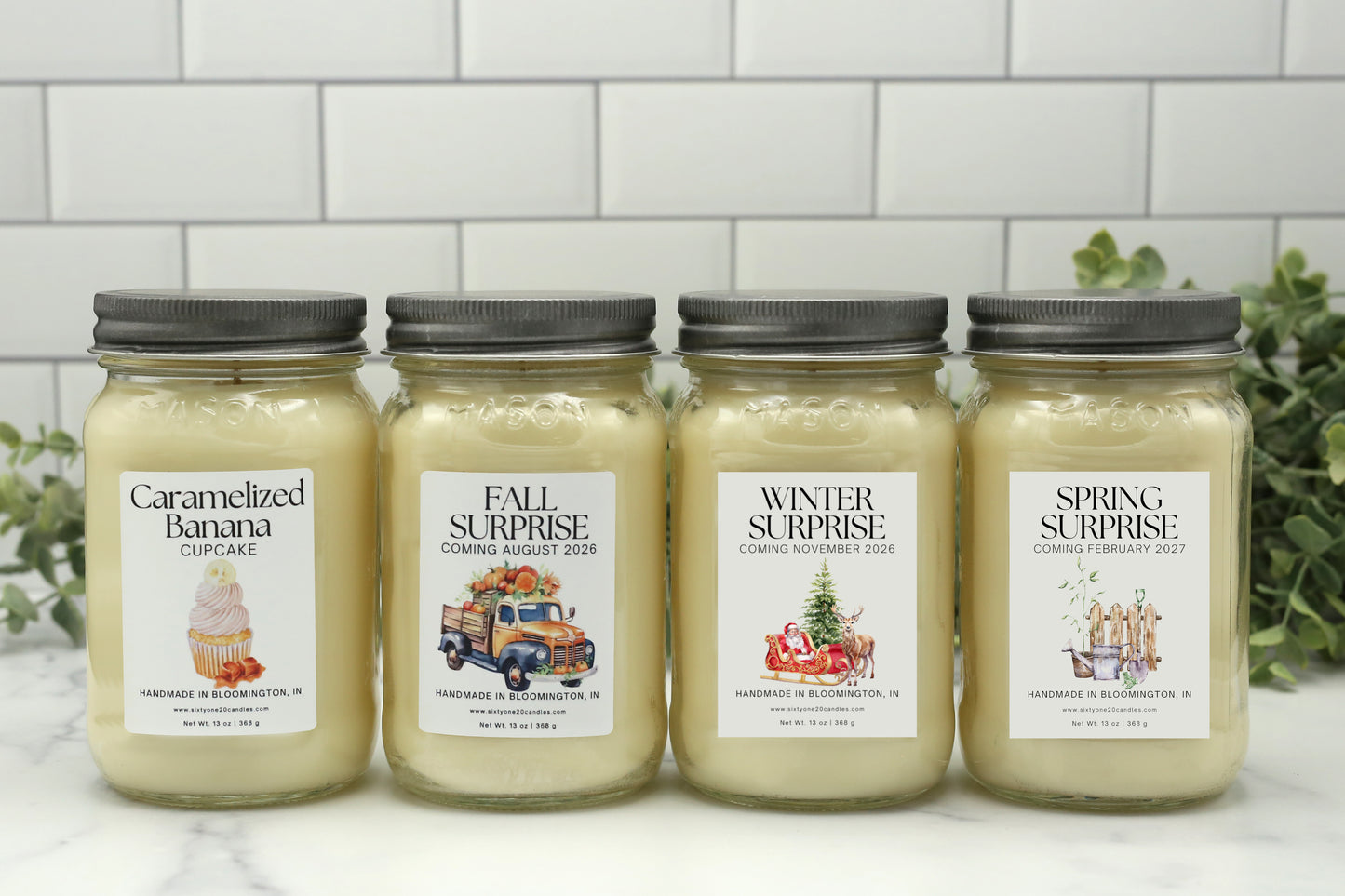 Full Year Candle Club subscription featuring four 16 oz soy candles in mason jars with silver lids for Summer, Fall, Winter, and Spring