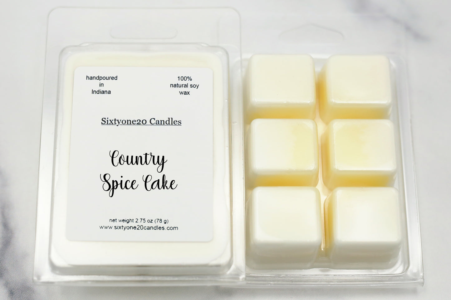 Country Spice Cake soy wax melts in clamshell packaging with six cubes and labeled front, shown on white marble background