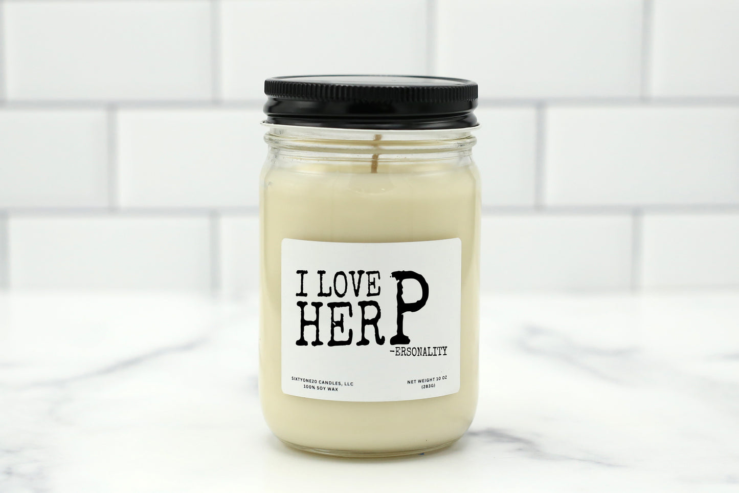 Soy wax candle with the label "I Love Her P (ersonality)" – a funny, flirty gift for her.