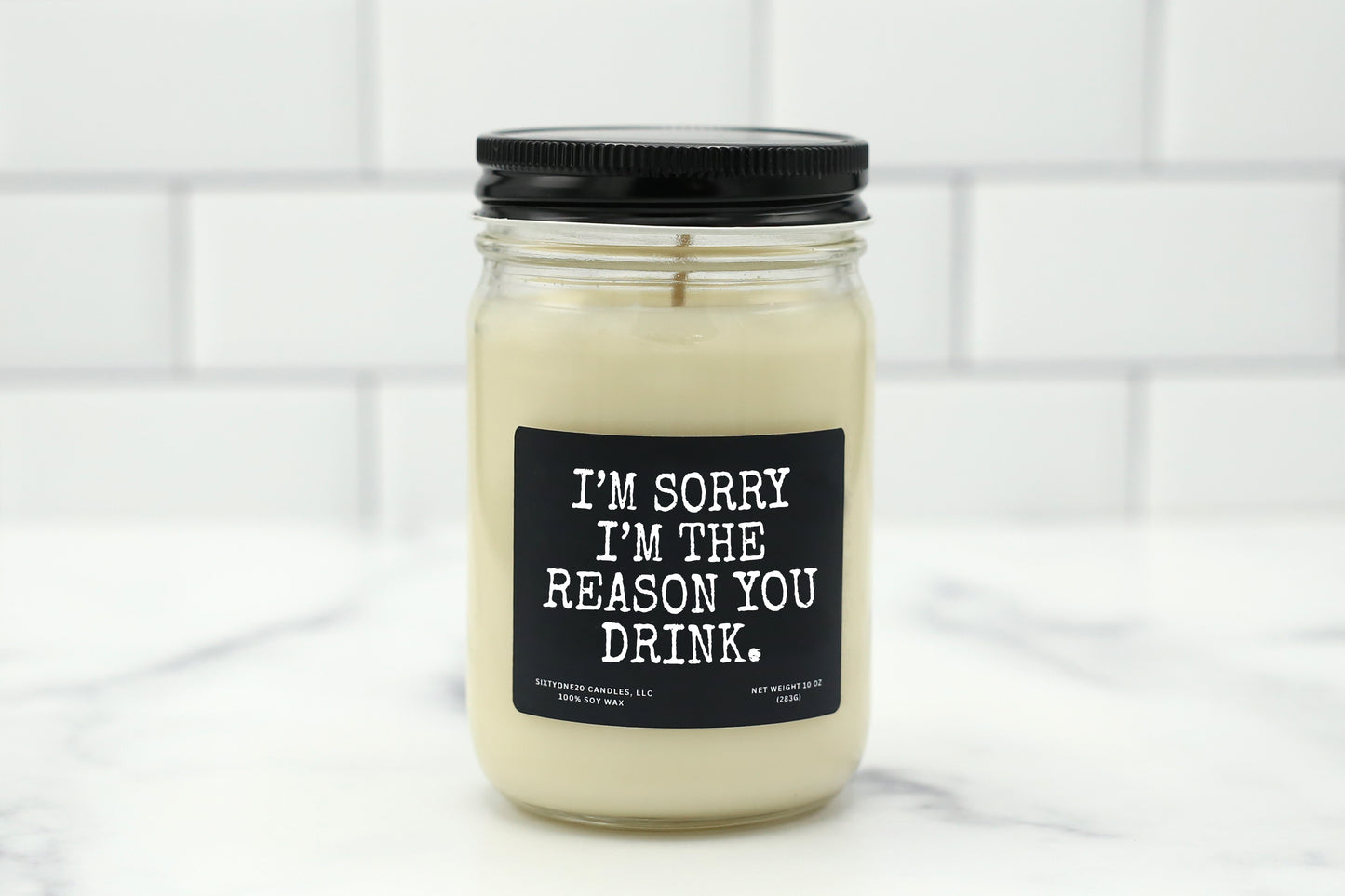 A 10 oz handmade soy wax candle with the label "I’m Sorry I’m the Reason You Drink"—a funny gift available in 10 custom scents, perfect for Mother’s Day, Father’s Day, or any occasion.