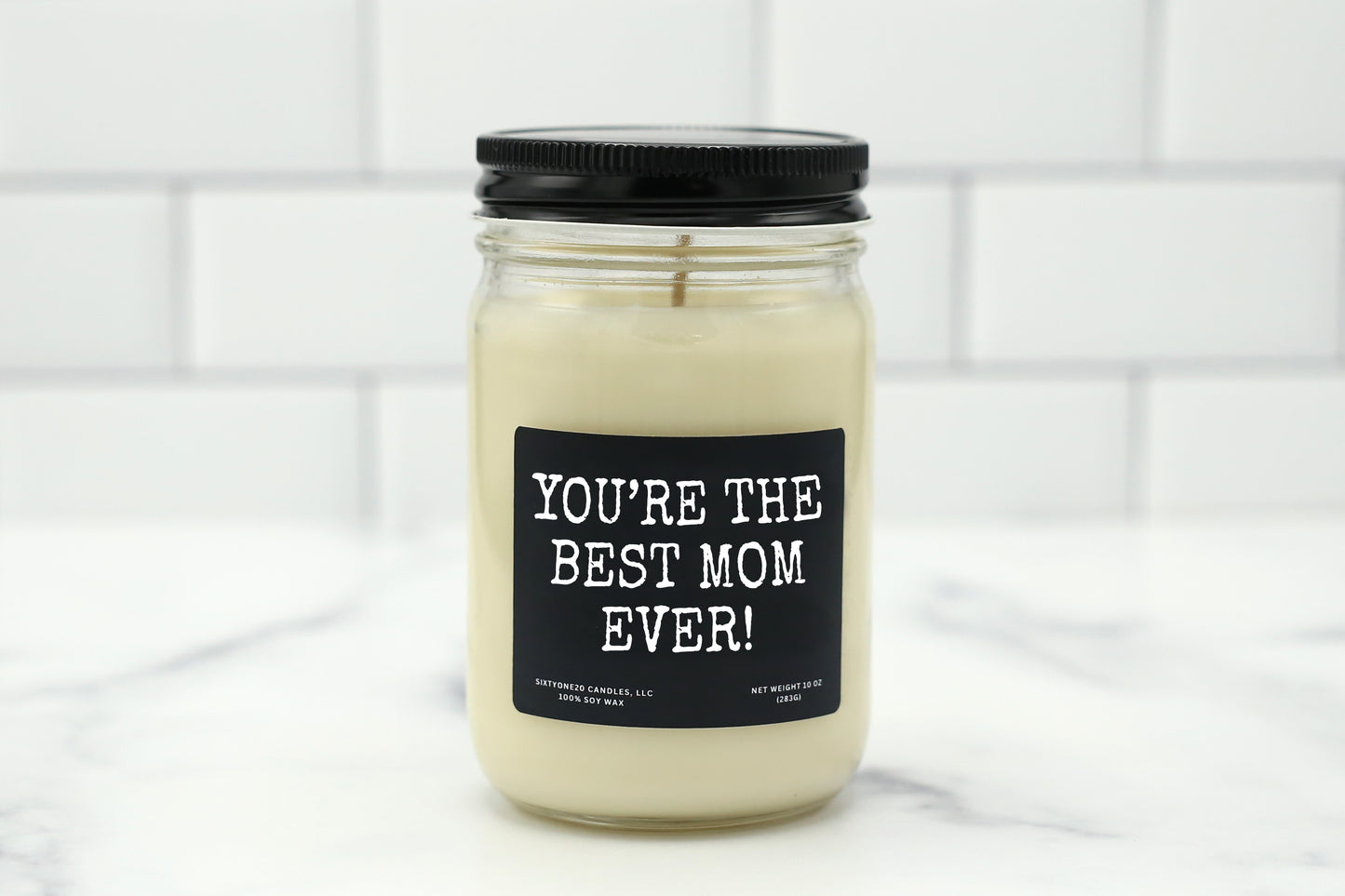 A 10 oz handmade soy wax candle with the label "You’re the Best Mom Ever!"—a heartfelt Mother’s Day gift available in 10 custom scents.