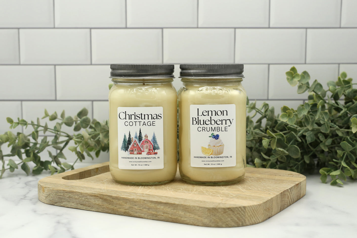 Winter and Spring Candle Club Bundle featuring Christmas Cottage and Lemon Blueberry Crumble in exclusive 16 oz mason jars.