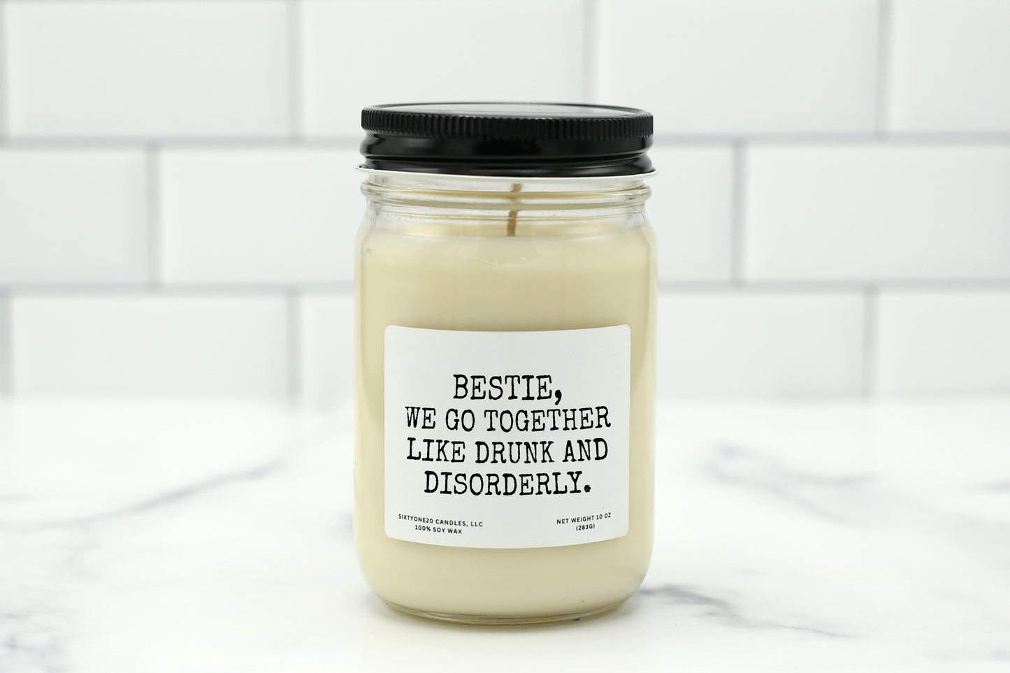 A 10 oz handmade soy wax candle with the label "Bestie, We Go Together Like Drunk and Disorderly"—a funny gift available in 10 custom scents, perfect for birthdays, Galentine’s Day, or bachelorette parties.