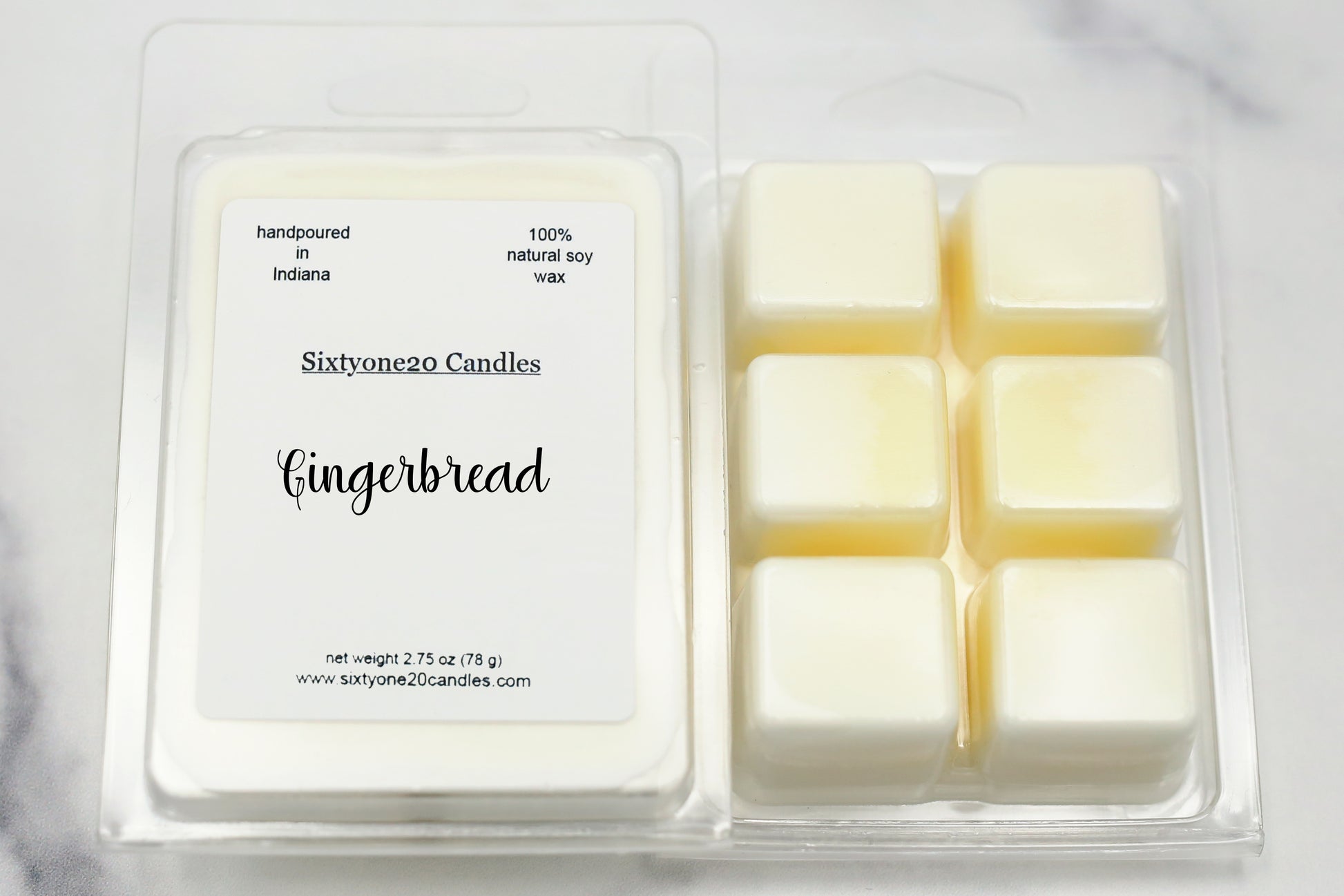 Sixtyone20 Candles soy wax melt labeled Gingerbread, displayed on a clean white background. Handmade melt in a clear plastic clamshell from Sixtyone20 Candles, Bloomington, Indiana.