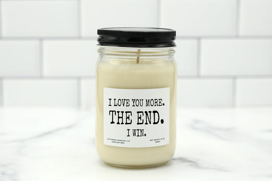 10 oz personalized candle with the saying 'I love your more. The end. I win,' available in various scents, made with natural soy wax.