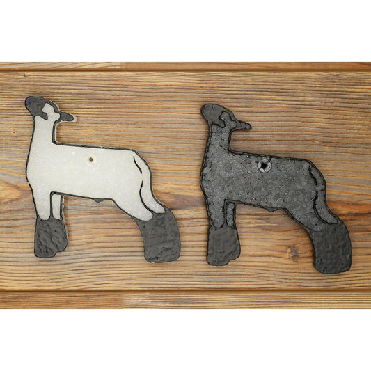 white and black show lamb car freshies on wood background