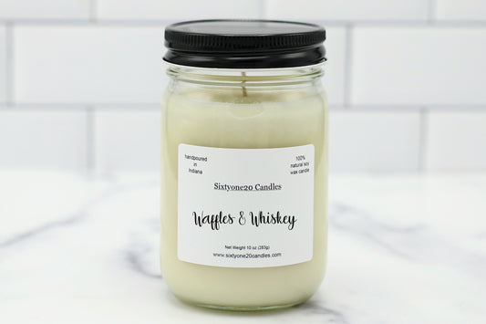 Waffles & Whiskey 12 oz soy candle in a mason-style jar with black lid, clean-burning and bakery-scented