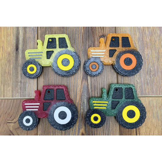 Four tractor-shaped freshies in classic country colors—perfect for the farmhouse, fair week, or your truck’s rearview mirror. Custom colors available.